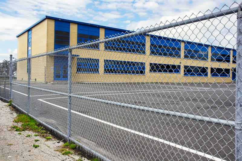 Commercial Fencing — School Fence in Visalia, CA Commercial Fencing — School Fence in Visalia, CA