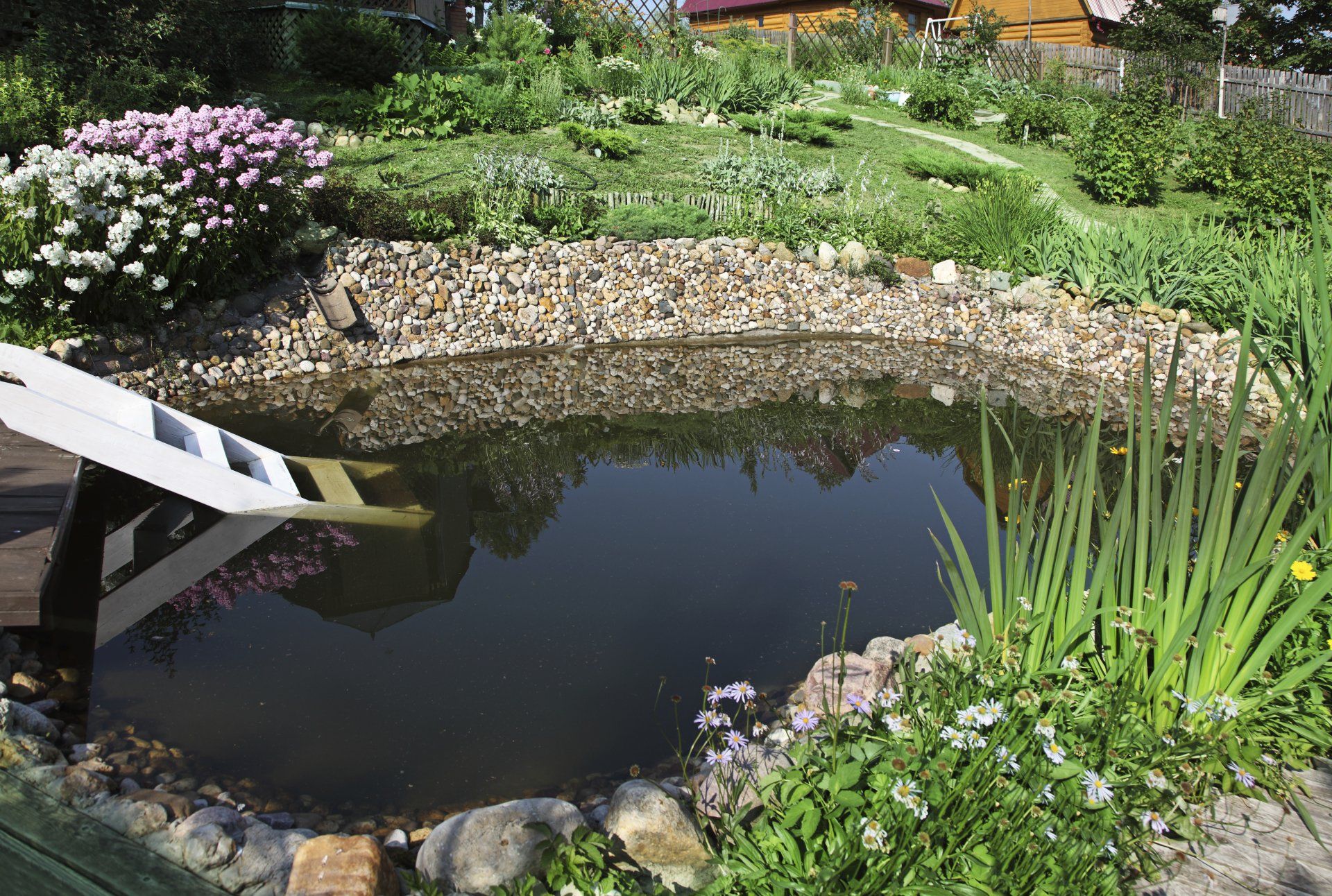 Tranquil Features Ponds — TM Landscaping LLC