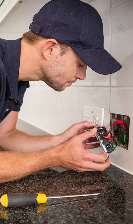 Residential Electrician — Checking the Electrical Cables in Sumner, WA Residential Electrician — Checking the Electrical Cables in Sumner, WA