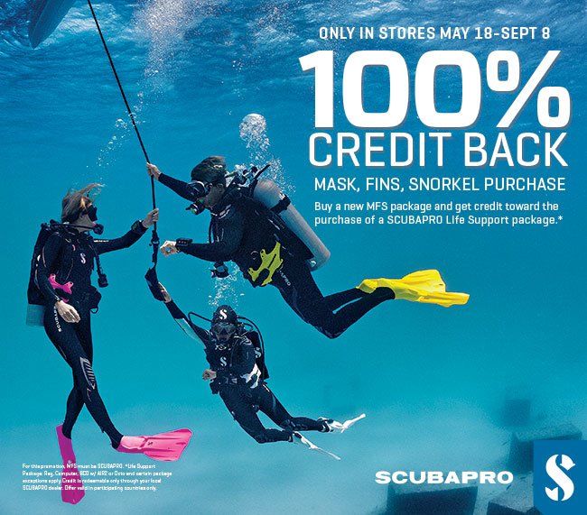 Scuba divers underwater. Promotion: 100% credit back on mask, fins, snorkel purchases from May 18-Sept 8.