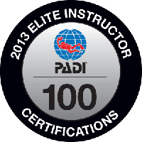 2013 PADI Elite Instructor badge, showing a globe, diver, and