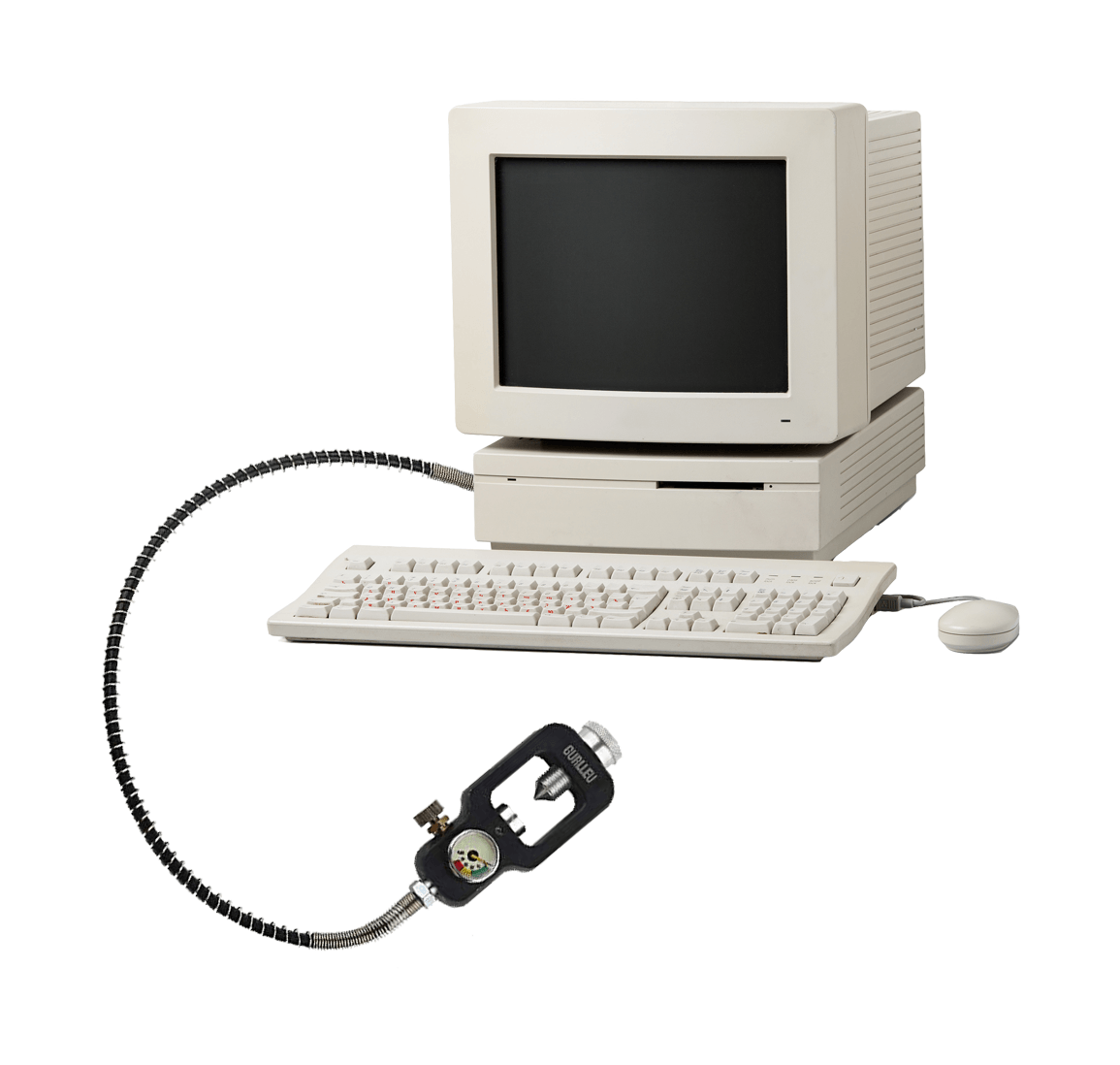 Old computer with diving gear attached, possibly for pressure monitoring.
