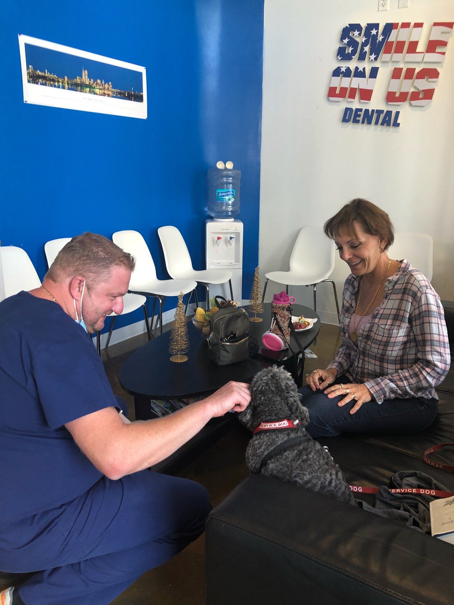 Dr. Illya Freyberg Petting Dog