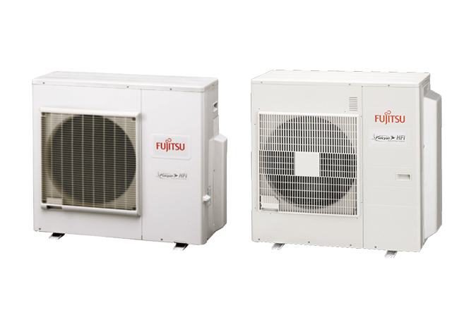 Two white Fujitsu outdoor air conditioning units side-by-side against a plain white background.