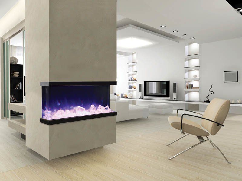 Modern living room with a corner electric fireplace emitting blue and pink light.