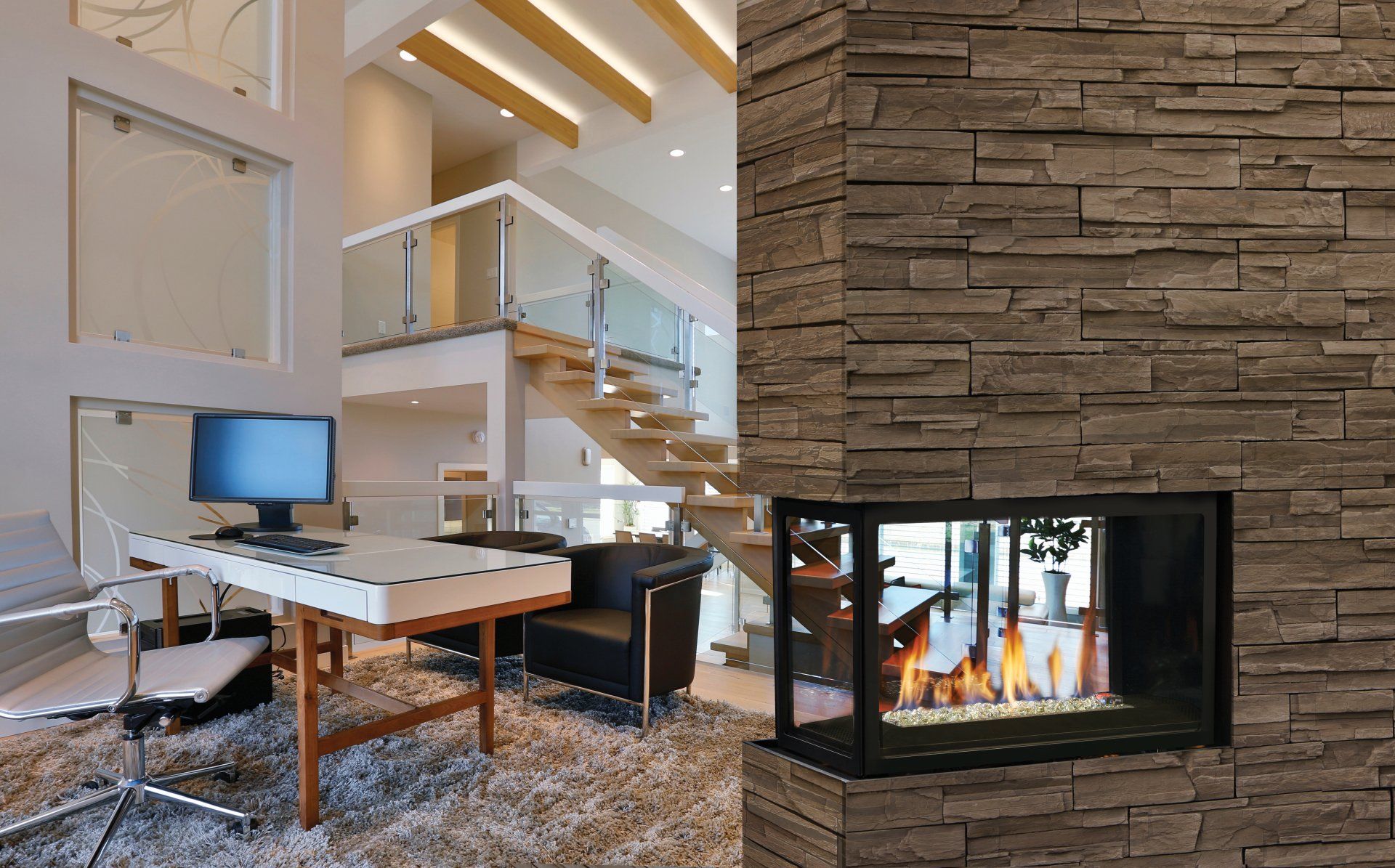 Modern living room with a stone fireplace, desk, and staircase.