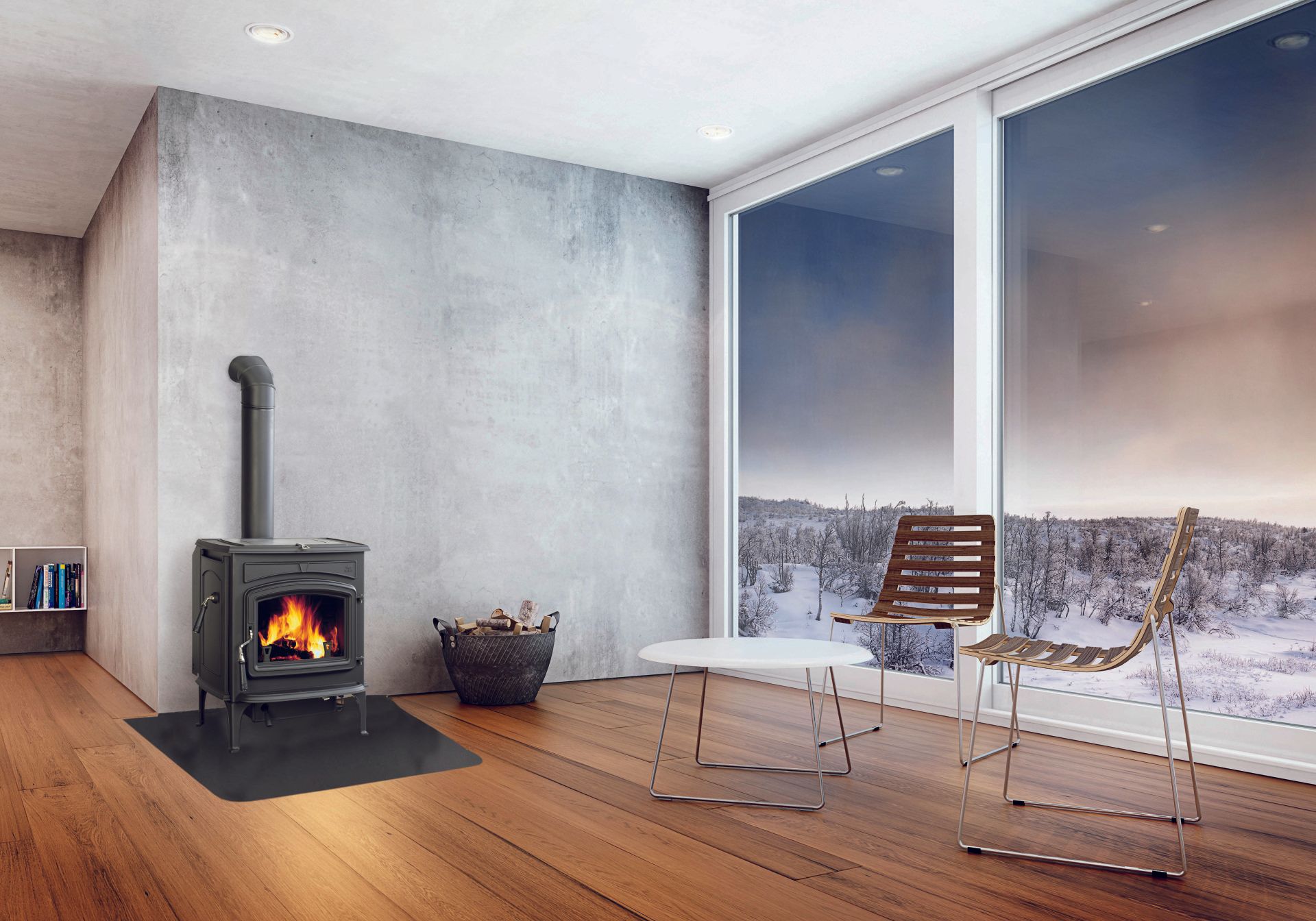 Wood-burning stove in a modern room with large windows overlooking a snowy landscape.