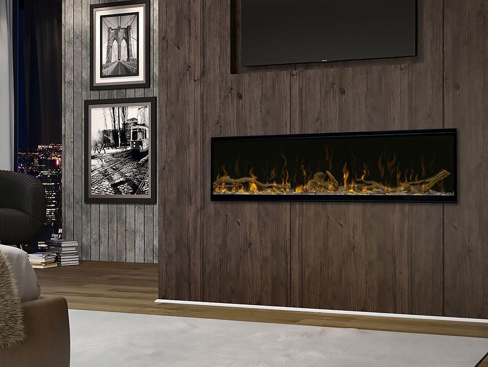 Electric fireplace with flames on a wood-paneled wall, under a TV and framed art.