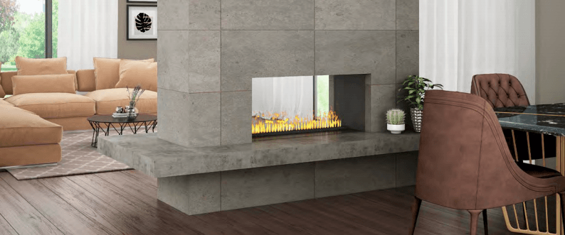 Modern living room with fireplace, beige sectional, and dining area with brown chairs.