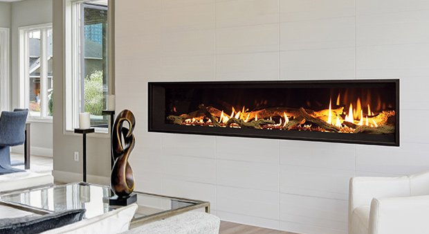 Long, modern fireplace with realistic flames in a white, minimalist living room.