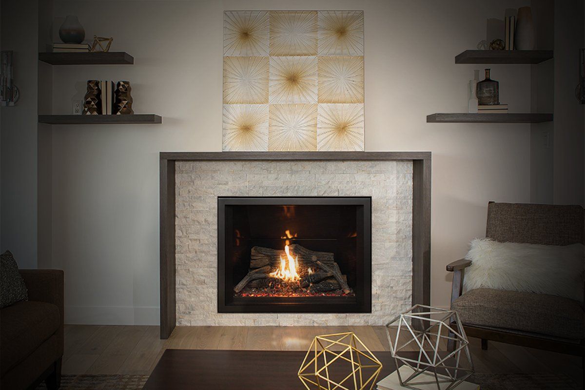 Fireplace with flames, decorated with shelves and gold-colored mosaic tiles.