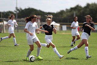 Lake Travis Girls Playing Soccer