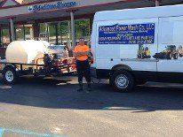 Standing in Front of Van - Power Washing Company Standing in Front of Van - Power Washing Company
