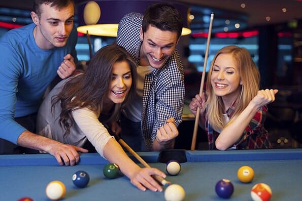 Friends Playing Billiards - Arcade in Everett, WA Friends Playing Billiards - Arcade in Everett, WA
