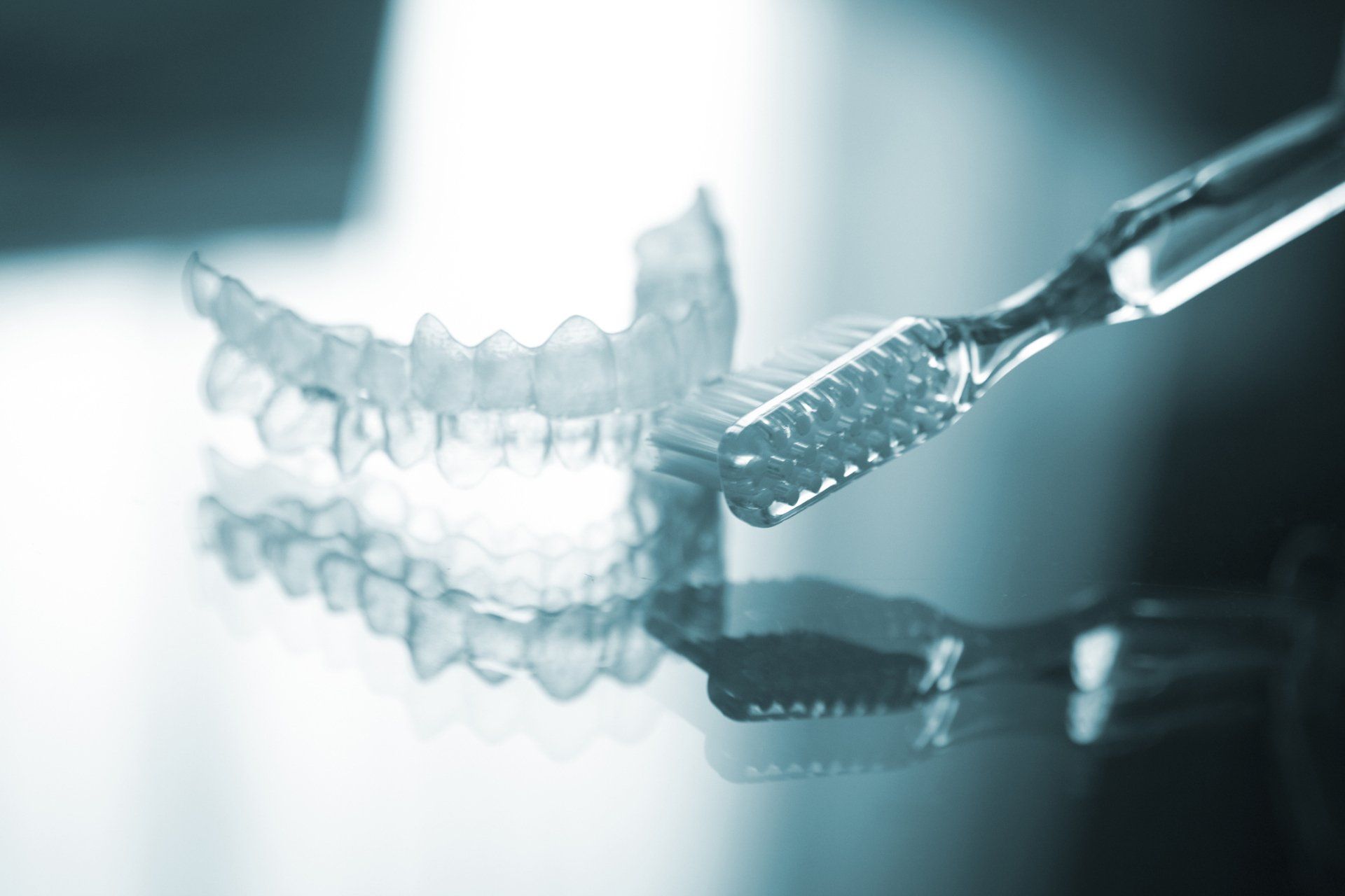 Brushing Invisalign — Saranac, MI — Dr. John McRee, D.D.S, P.C.