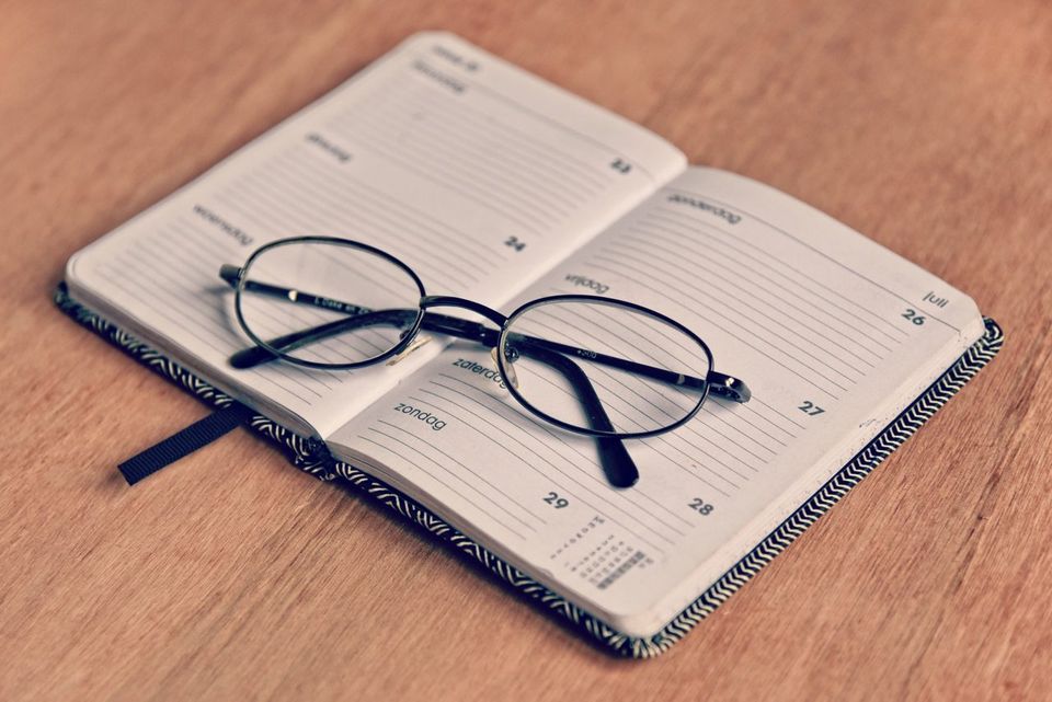 Eyeglasses on a Notebook | Manteca, CA | Legacy Local Impact Eyeglasses on a Notebook | Manteca, CA | Legacy Local Impact