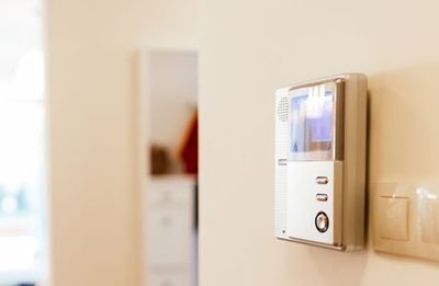 Business Surveillance Camera on a Wall — Essex Junction, VT — Sun Ray Fire & Security