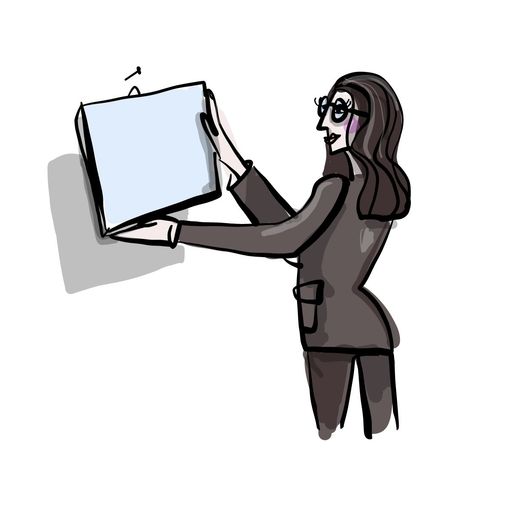 Art market specialist Tanja Pol holding a painting up on a wall as if she is installing an exhibition or helping a collector