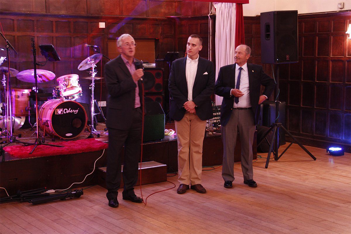 W Bros Thomas Day and Michael Dennis present a donation to Ron Pickford of the Hertfordshire Society for the Blind