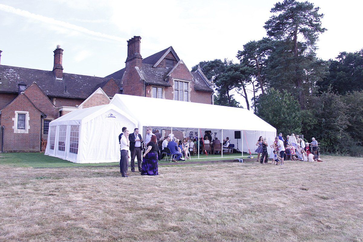 The Brethren and their guests celebrate in the July sunshine
