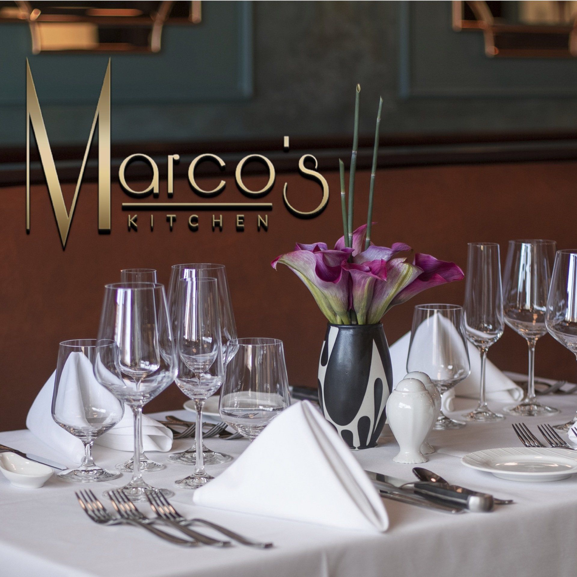 A table set for a meal at marco 's kitchen