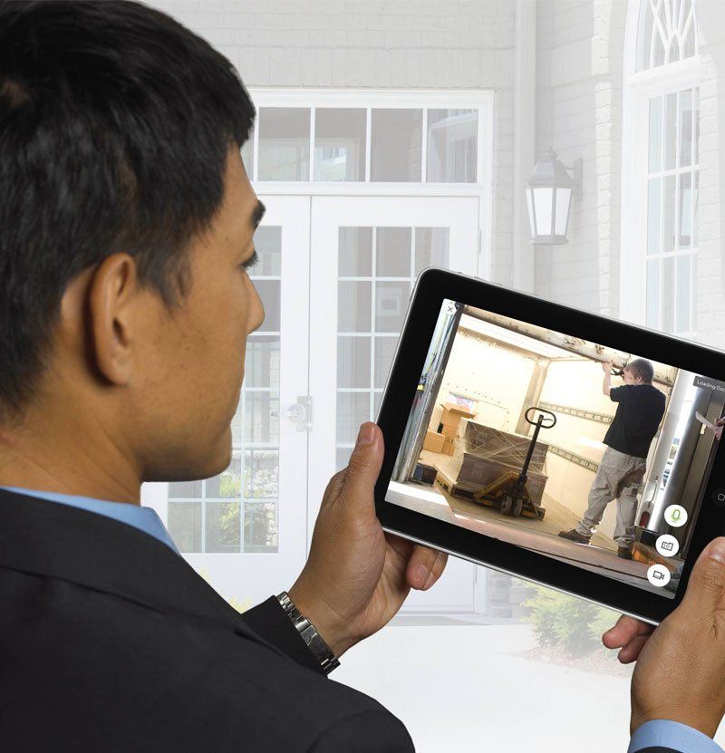 Checking Security Footage via Tablet Device — Rocklin, CA — Foothill Alarm Systems Checking Security Footage via Tablet Device — Rocklin, CA — Foothill Alarm Systems