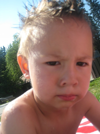 Little boy looking for brand name clothing