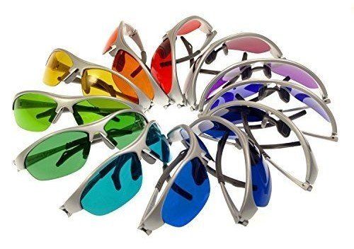 A bunch of different colored sunglasses are arranged in a circle
