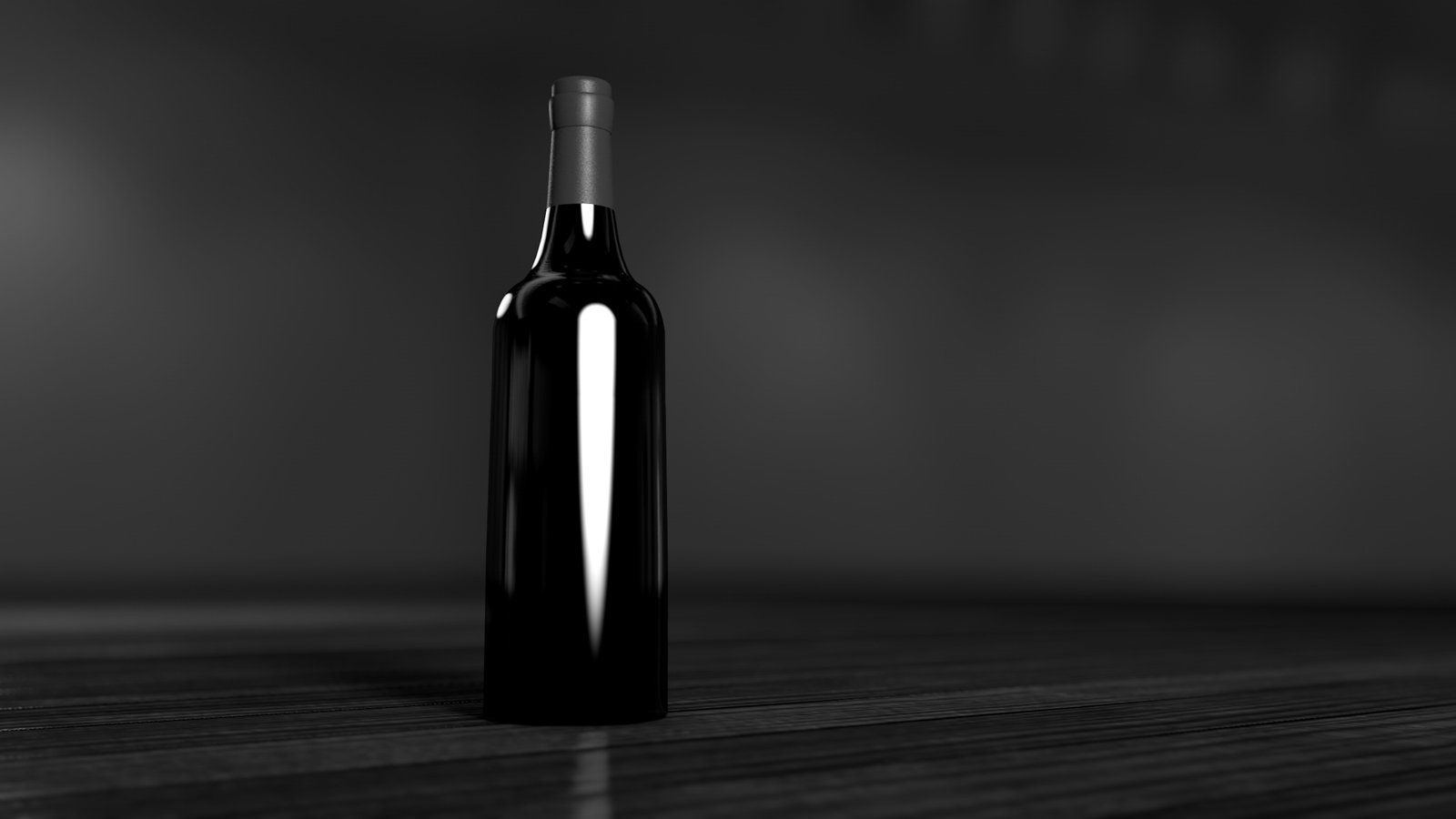 A black and white photo of a bottle of wine on a wooden table.