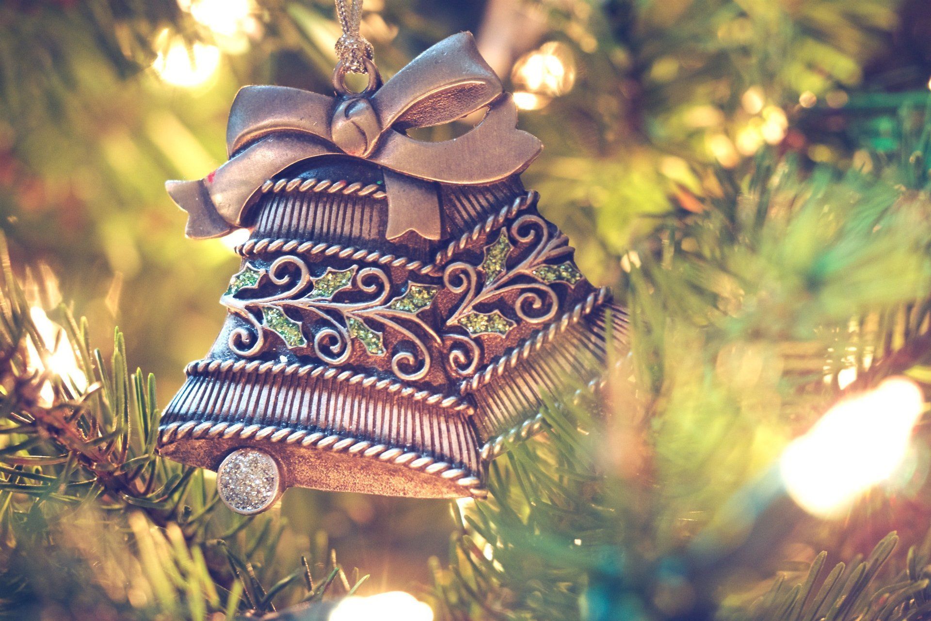 Bell Christmas ornaments on a tree