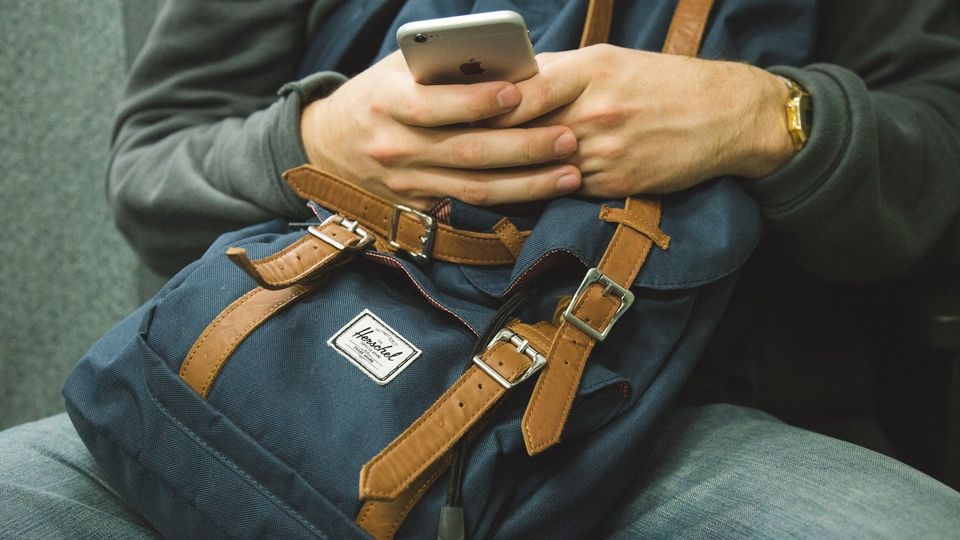 man using phone online