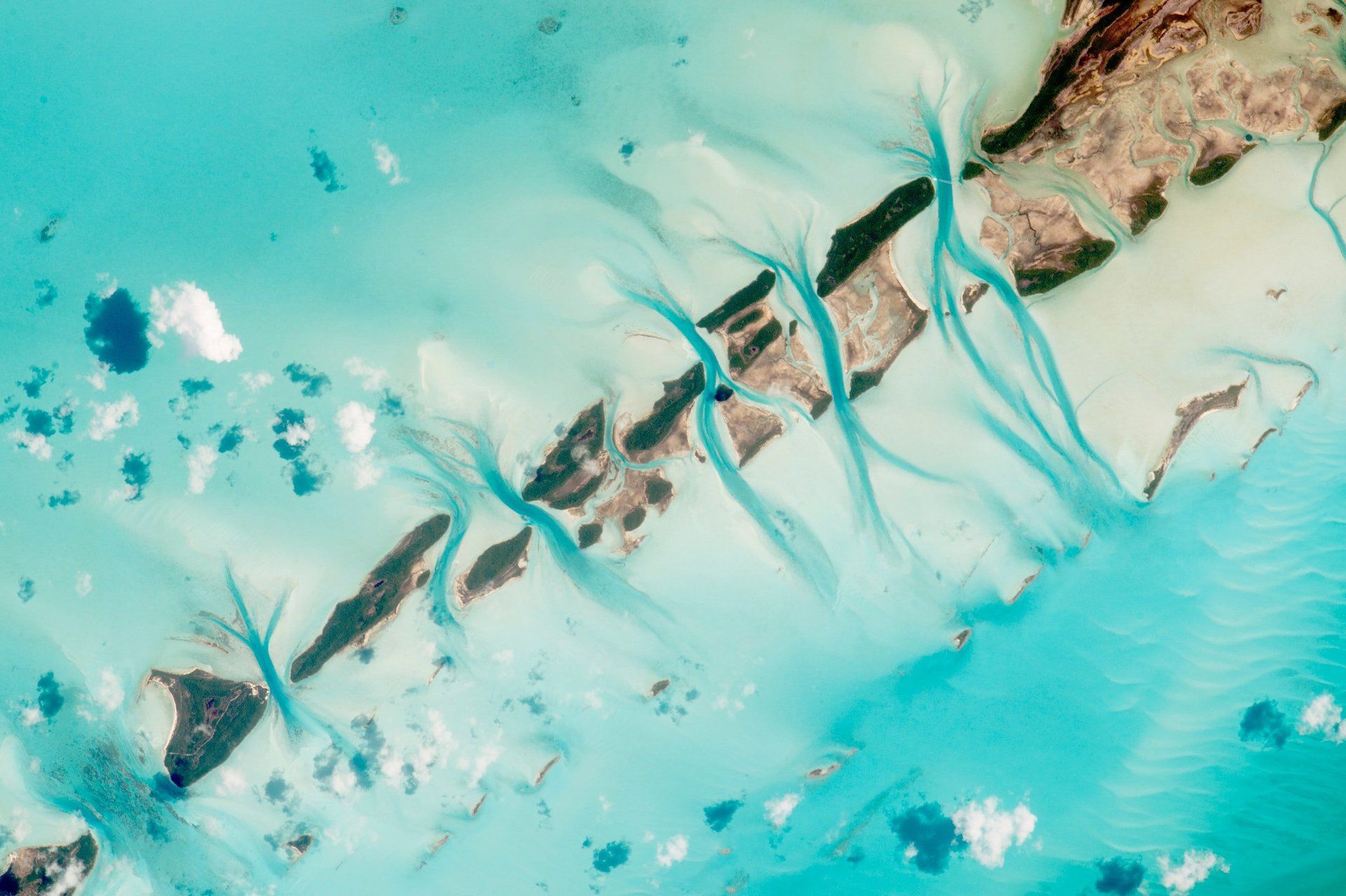 An aerial view of a body of water with a river running through it