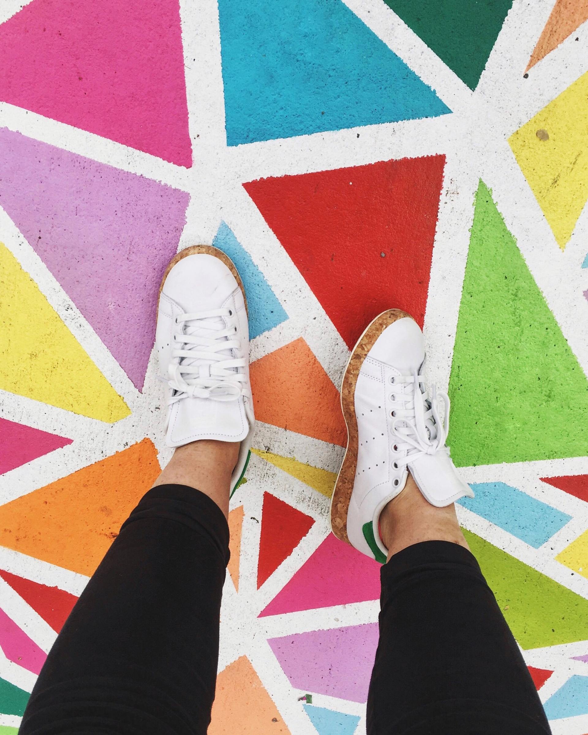 trainers on a colourfull floor