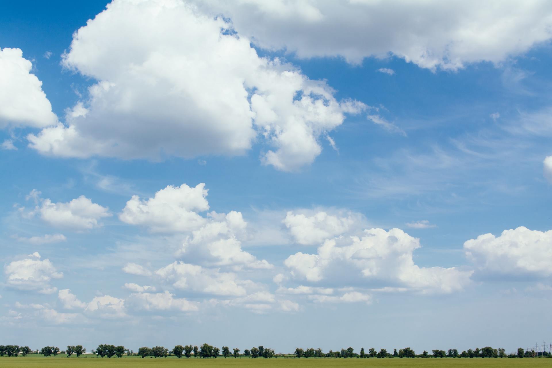 Photo of sunlit sky with clouds