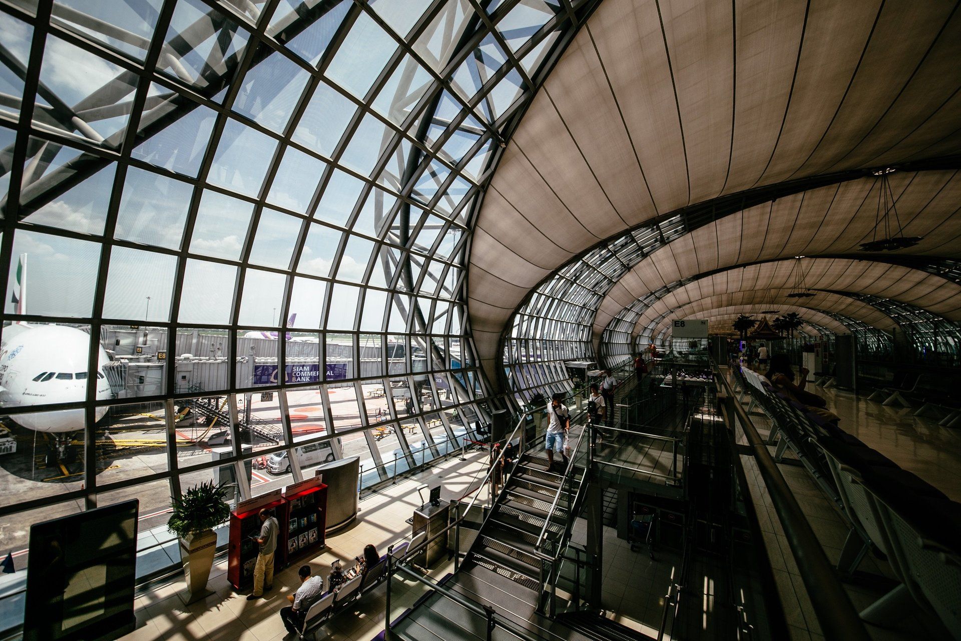airport terminal with bent safety glass