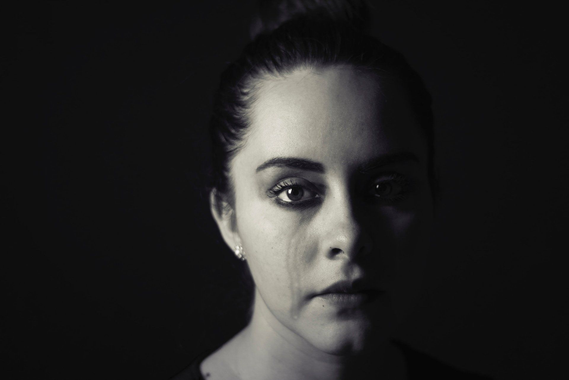 emotional pain in a woman's face