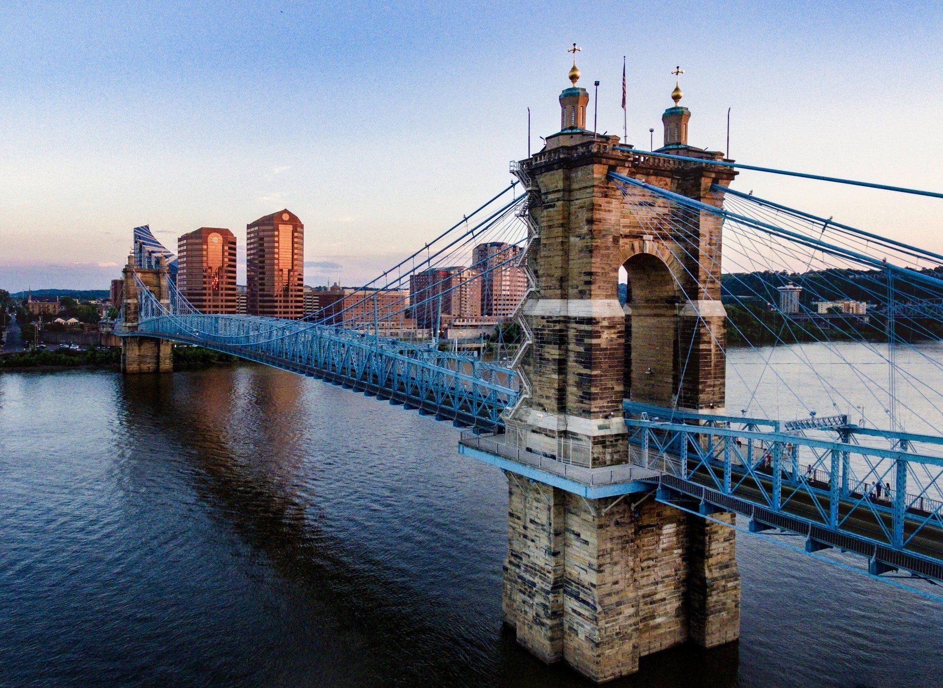An aerial view of a bridge over a body of water.