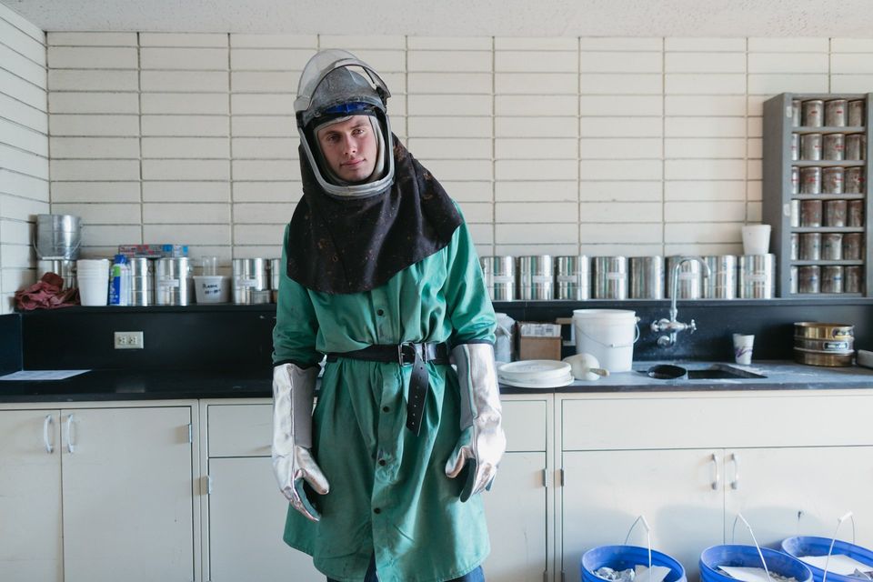 Man is laboratory protective gear