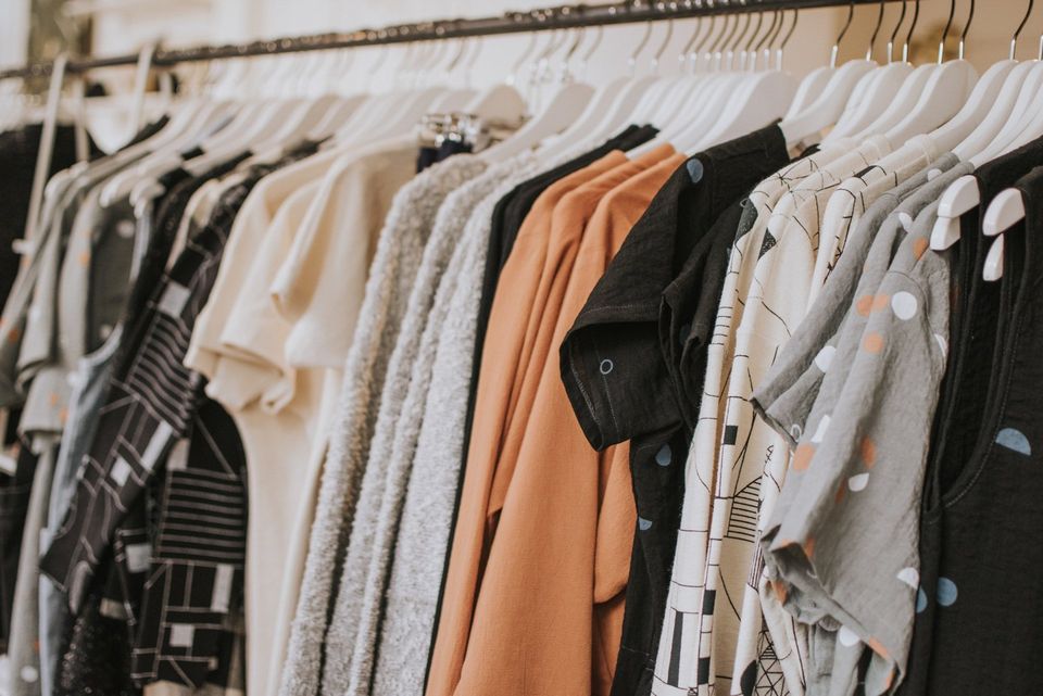 Clothes hanging in a closet
