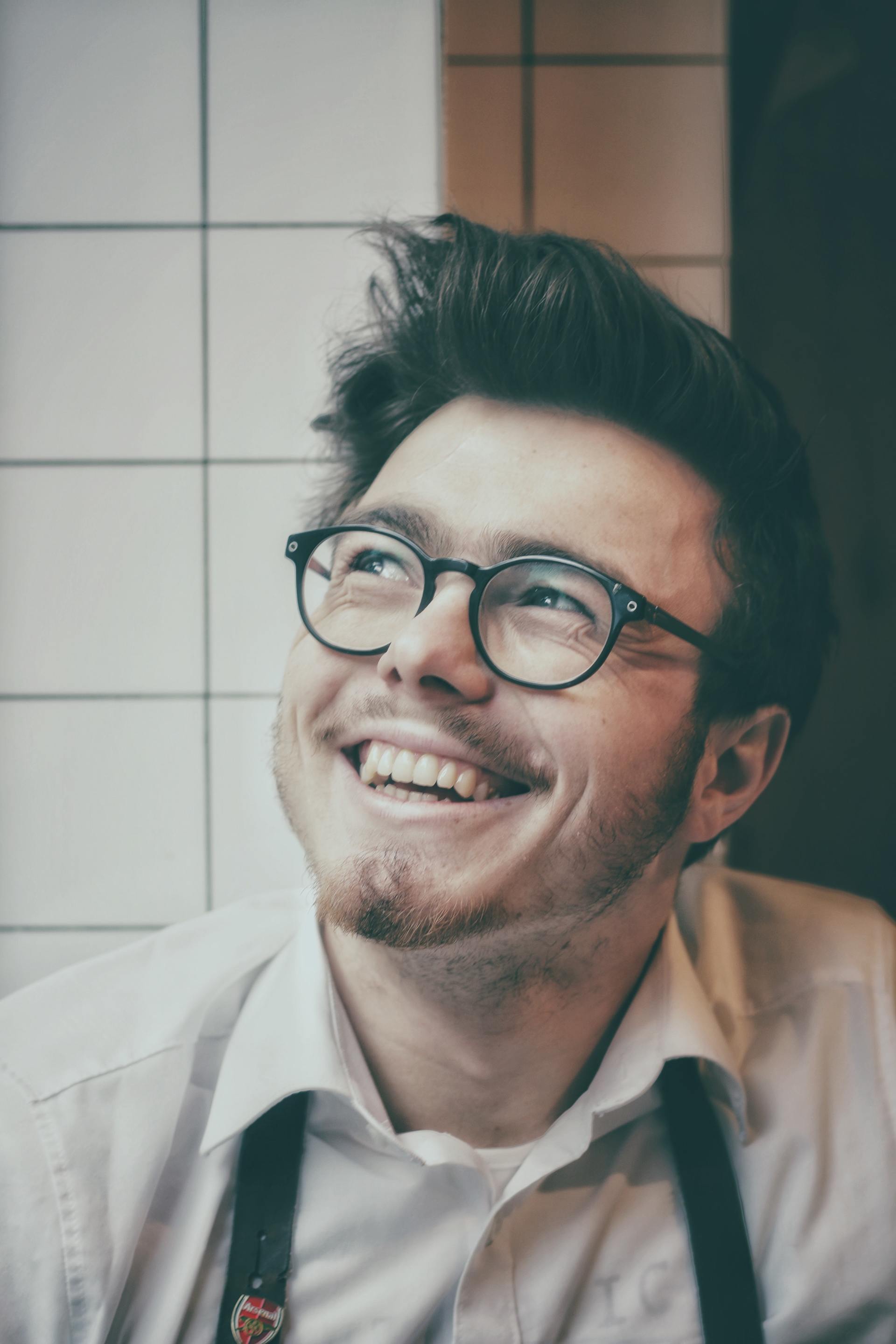 cosmetic dentists in Lawrence KS | Man Smiling | Fillings, Veneers, Root Canals