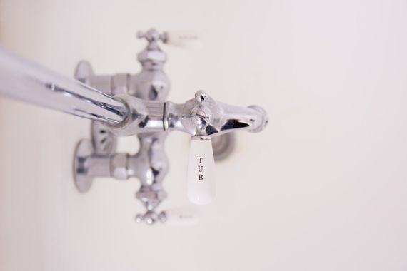 leaking faucet being repaired