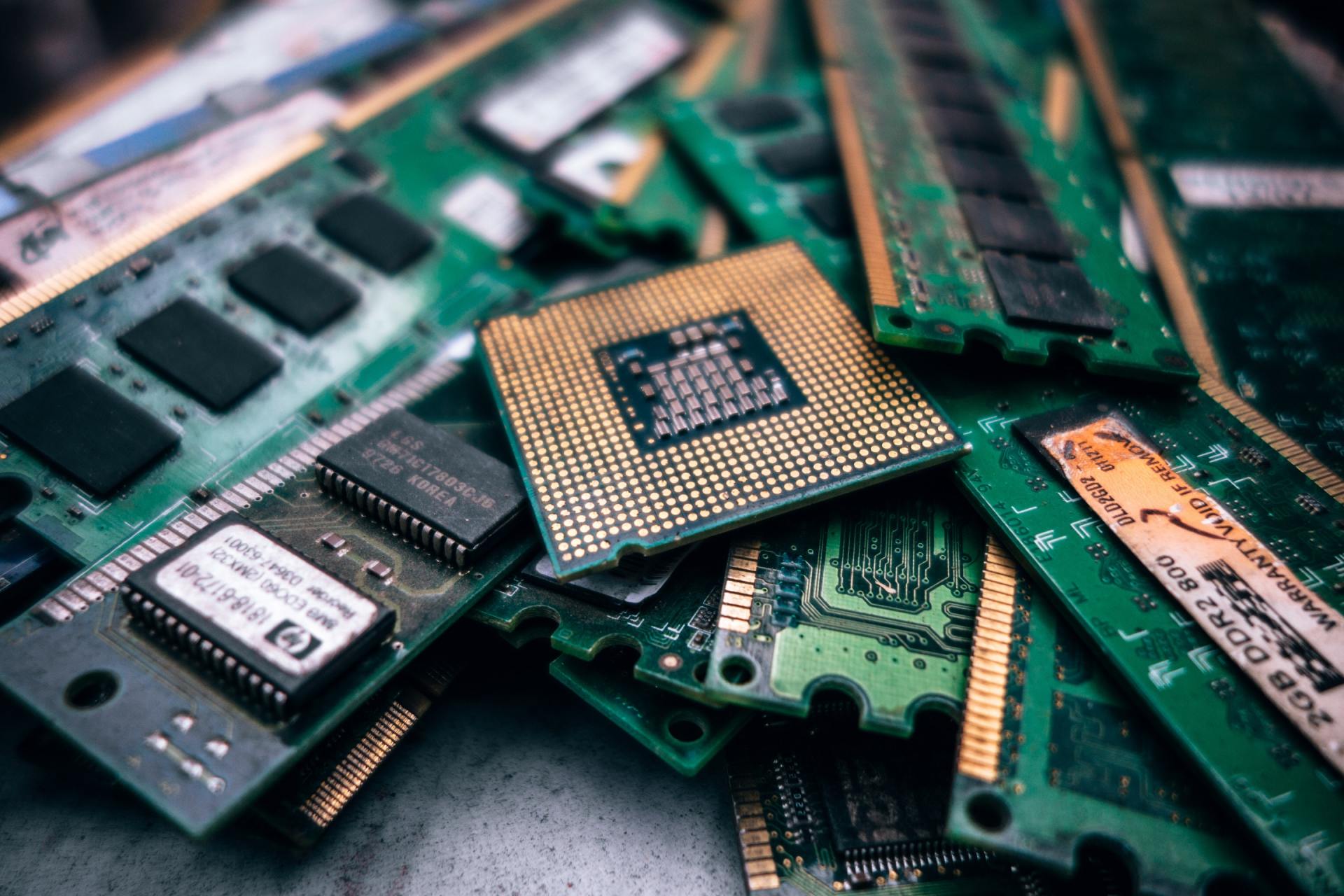 A pile of electronic components including a cpu and ram.