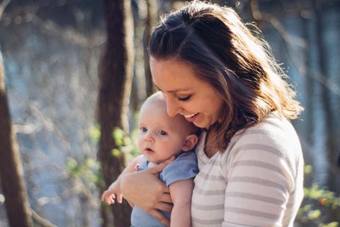 Mother with baby. Returning to work with the support of career break coaching.