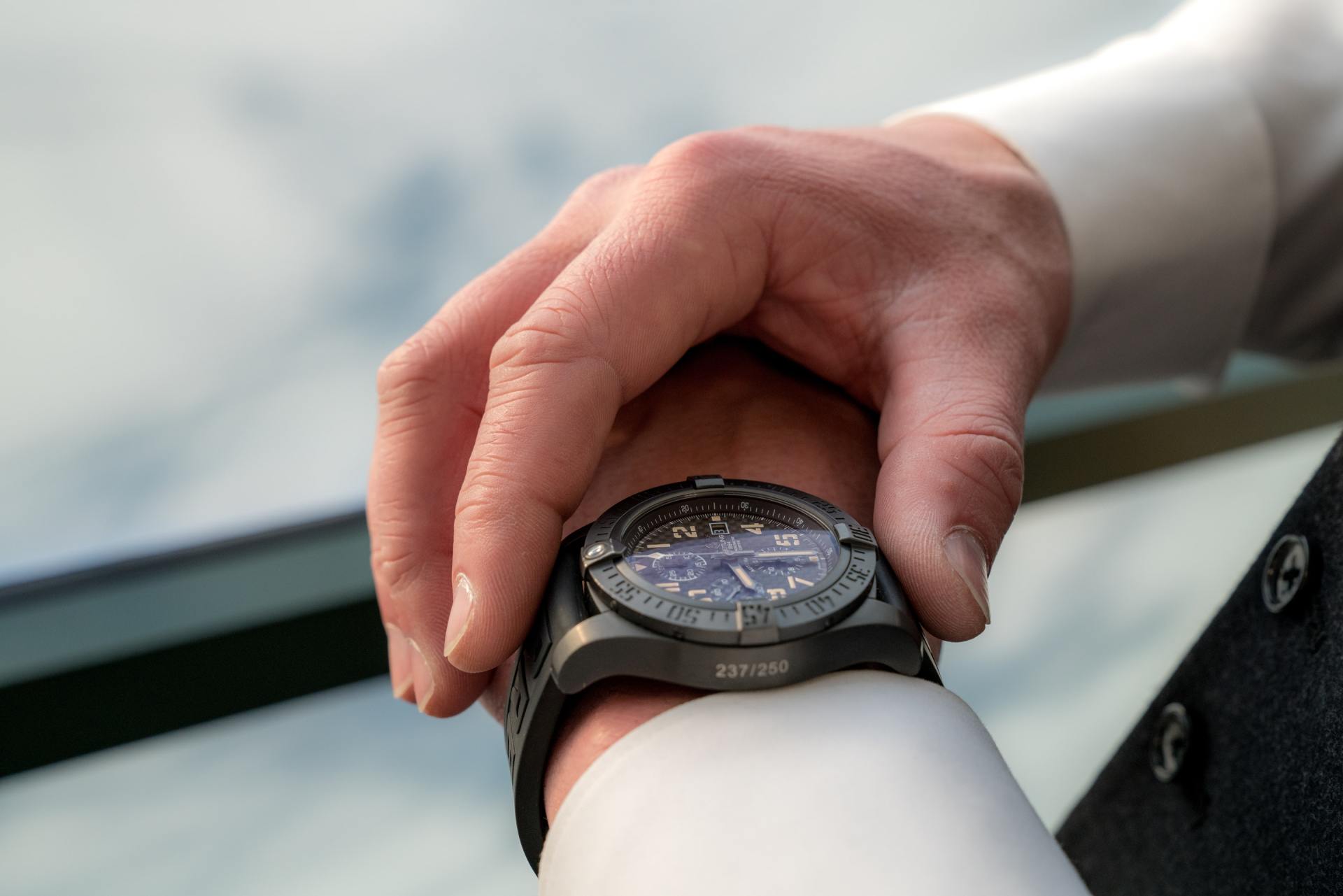 hands holding a watch