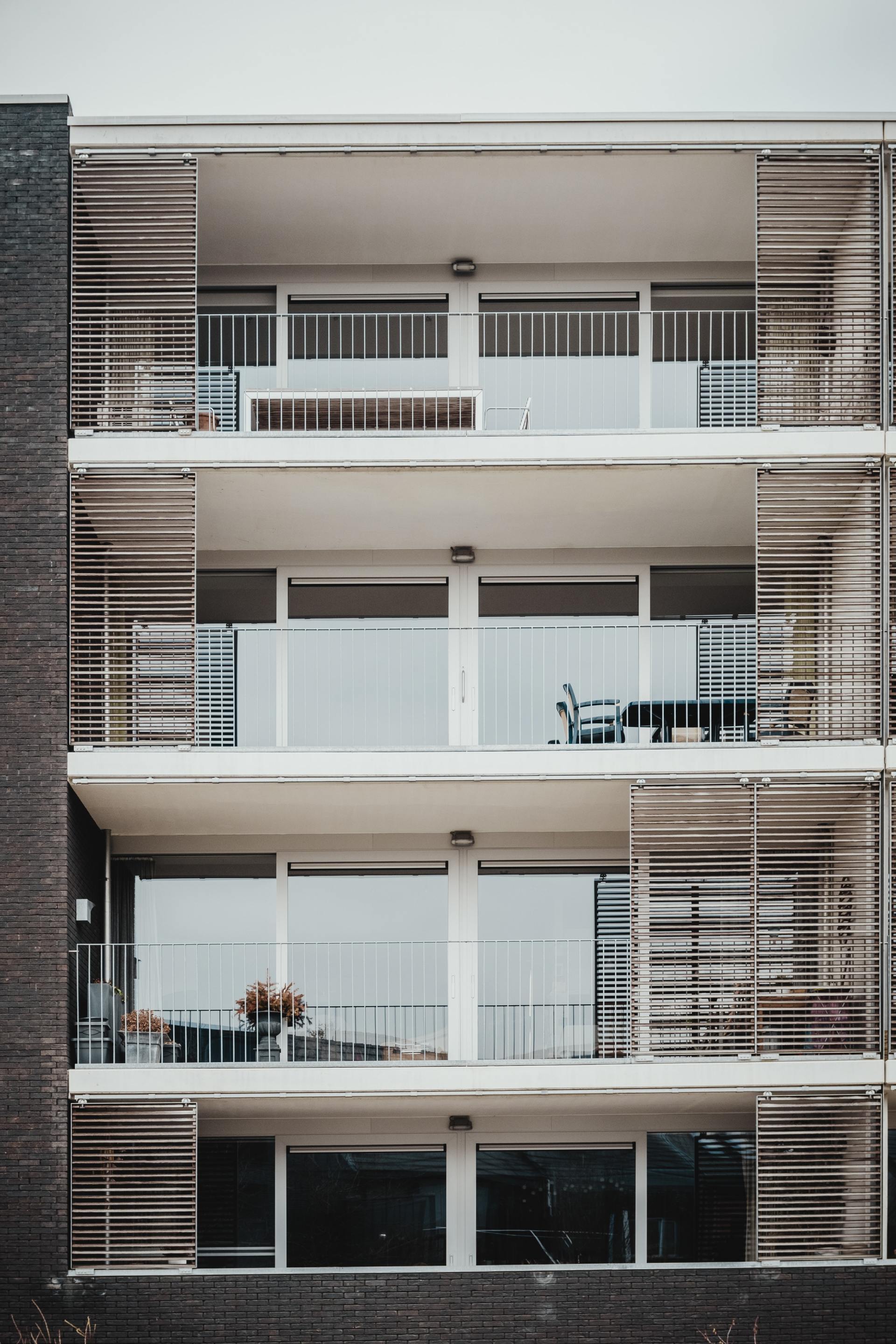 house with stack of coins
