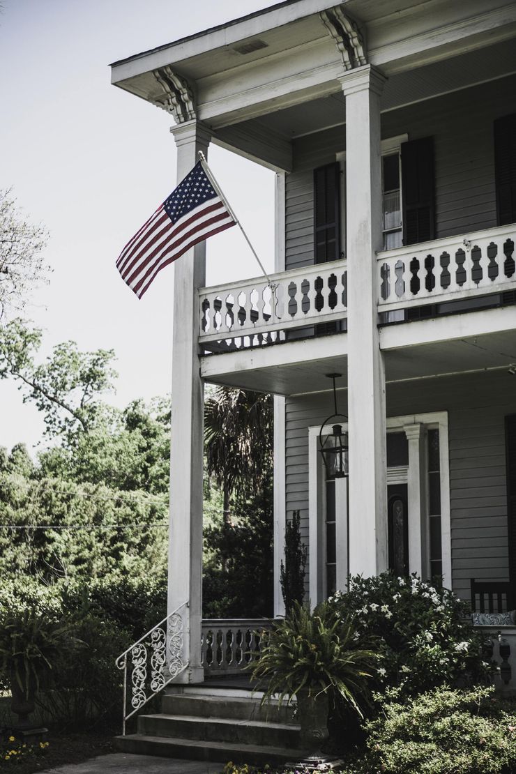 Front of home with American flag
