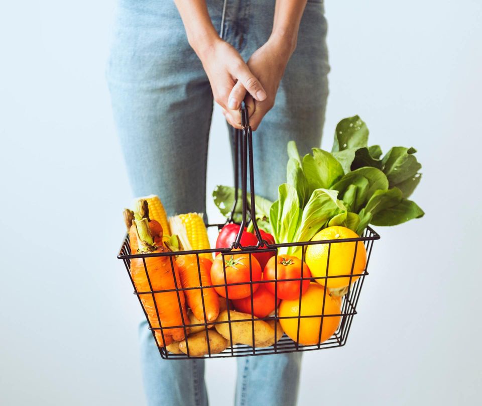 Grocery basket full of vegetables