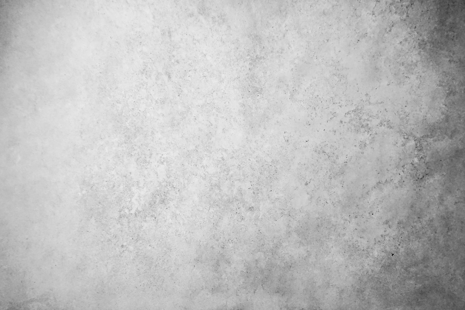 It is a black and white photo of a concrete wall.