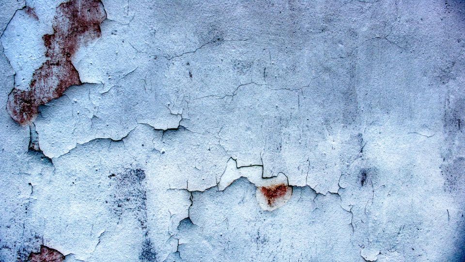 Cracked and chipped wall. Painters In Philly