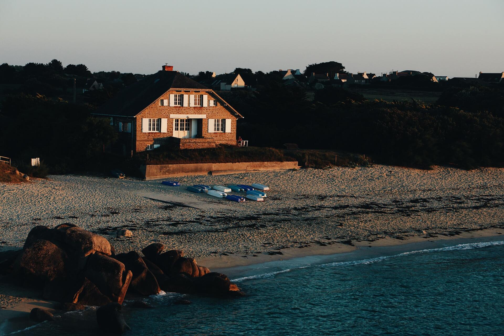 waterfront home in sunset